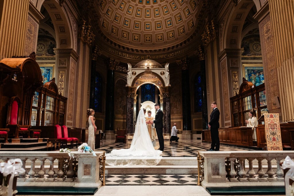 bride and groom standing at the altar