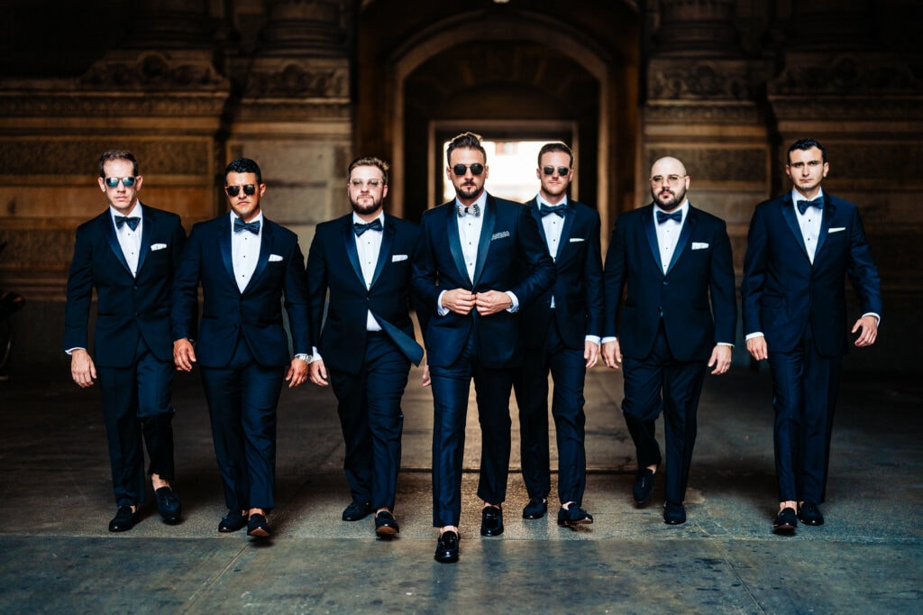 groom posing with the groomsmen