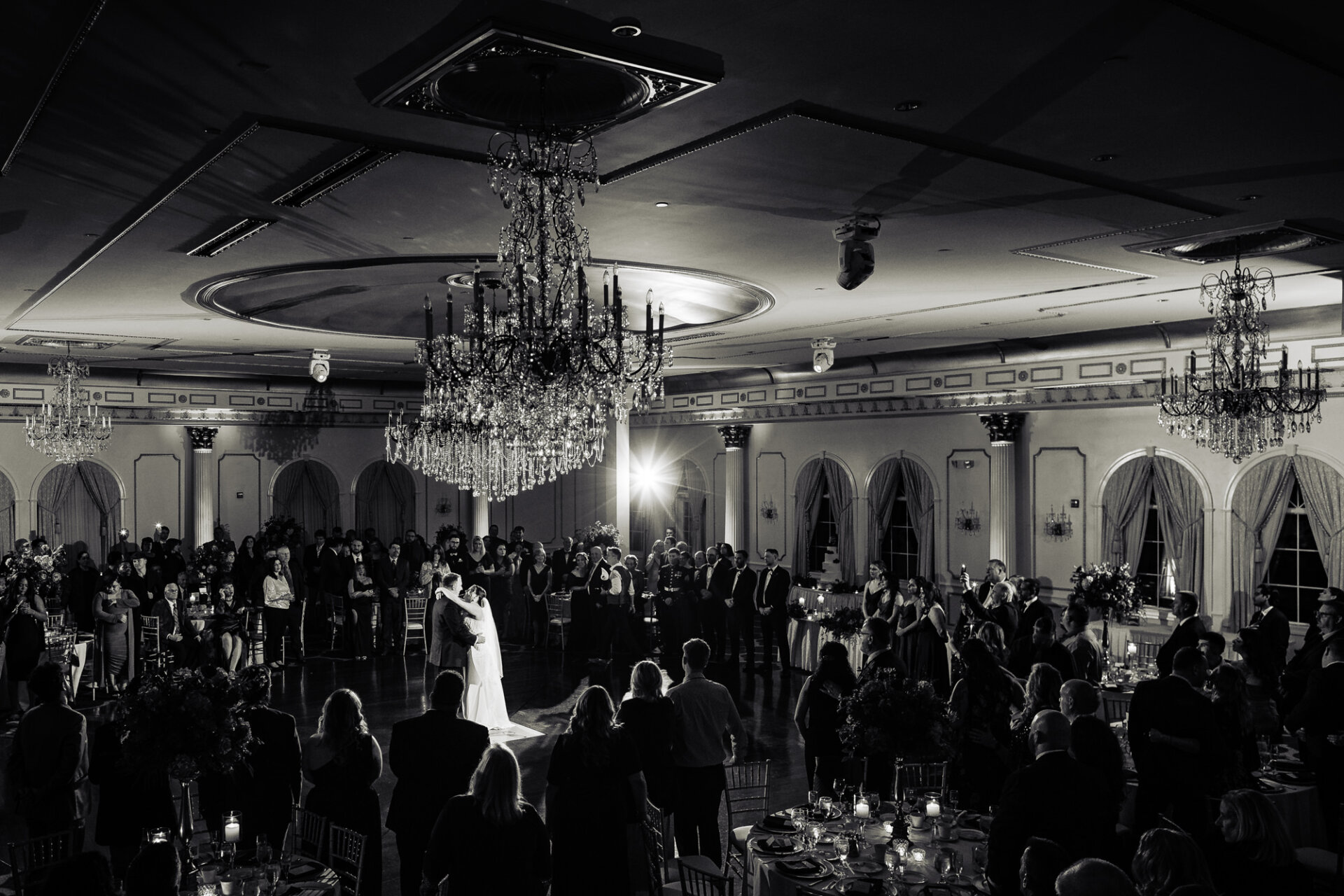 In a timeless black and white shot, the couple's first dance as husband and wife is captured in all its elegance and romance.