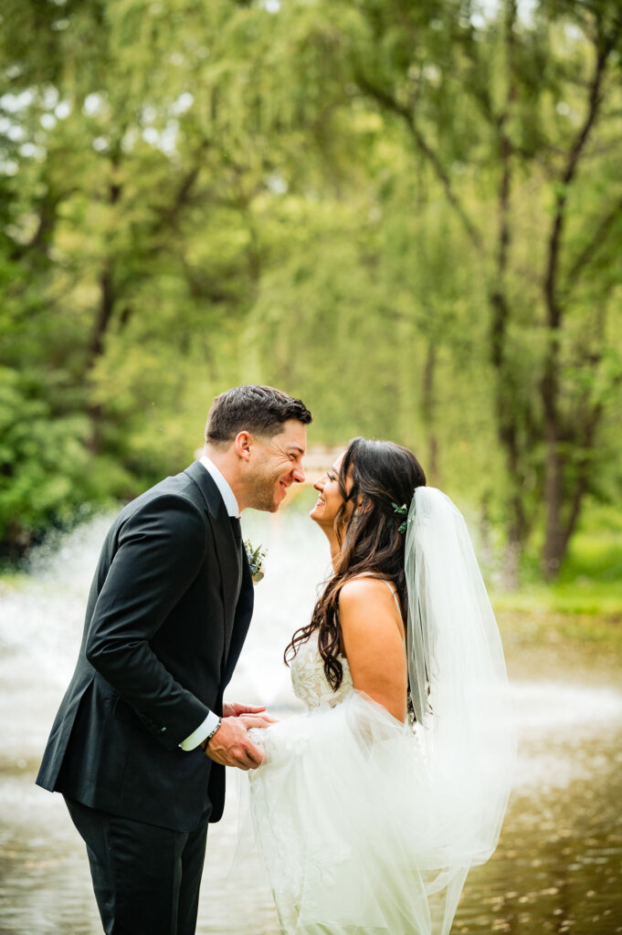 The bride and groom tenderly gaze into each other's eyes