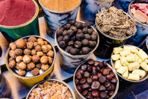 Colorful array of spices adorning the streets of Old Dubai, enticing passersby with their rich hues and aromas
