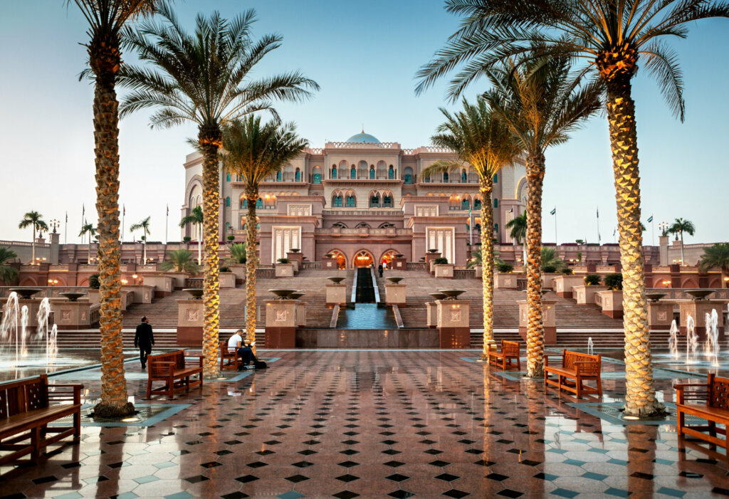 Grand entrance of the Emirates Palace Hotel, showcasing its regal design and unparalleled luxury.