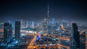 the downtown Dubai at night with the Burj Khalifa at the center