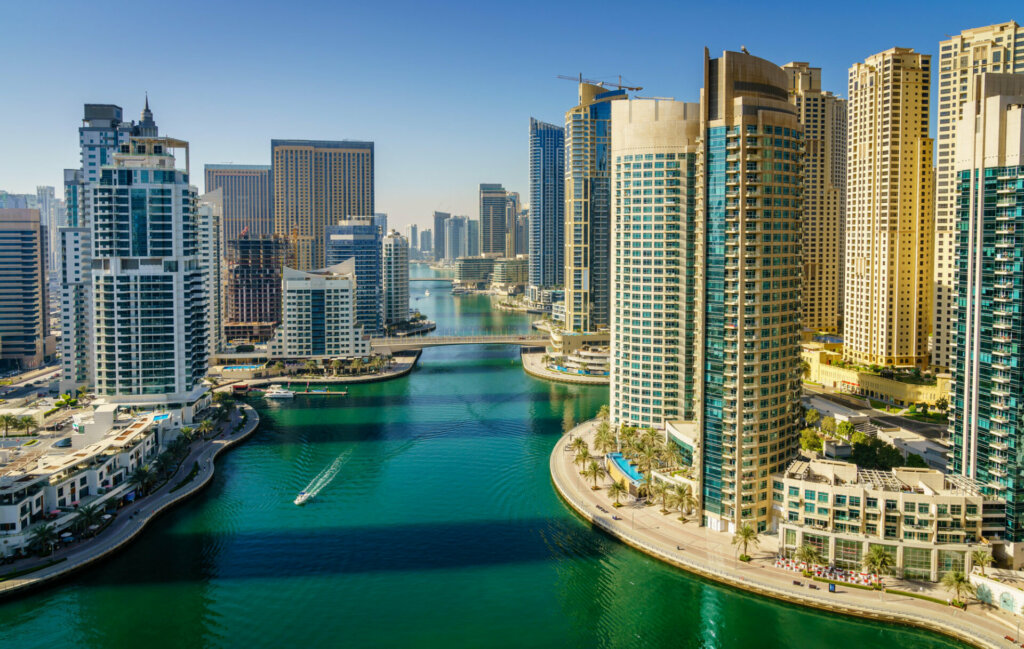 Dubai Marina is a waterfront city, the emerald-green waters framed by some of the tallest – not to mention some of the most architecturally impressive – residential towers in the world.