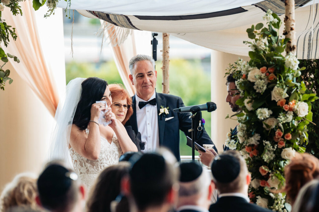 bride getting emotional during the wedding ceremony
