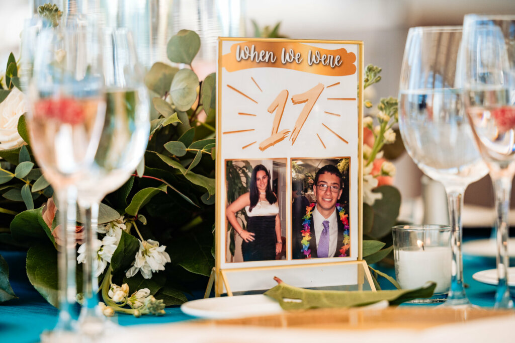 Photocards of the newlyweds placed on top of the table when they were still 17 year olds