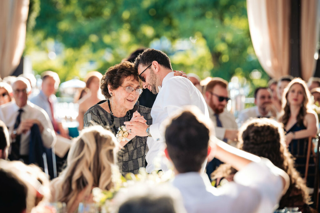 Touching moment as the groom dances with his mother during the wedding reception.