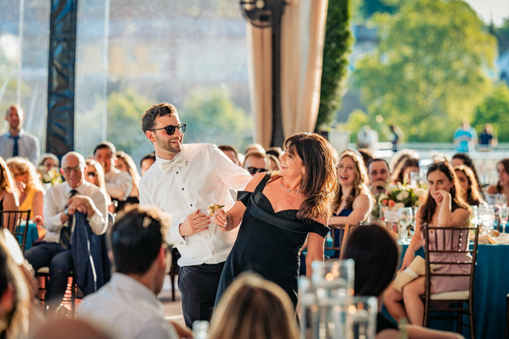 Touching moment as the groom dances with his mother during the wedding reception.