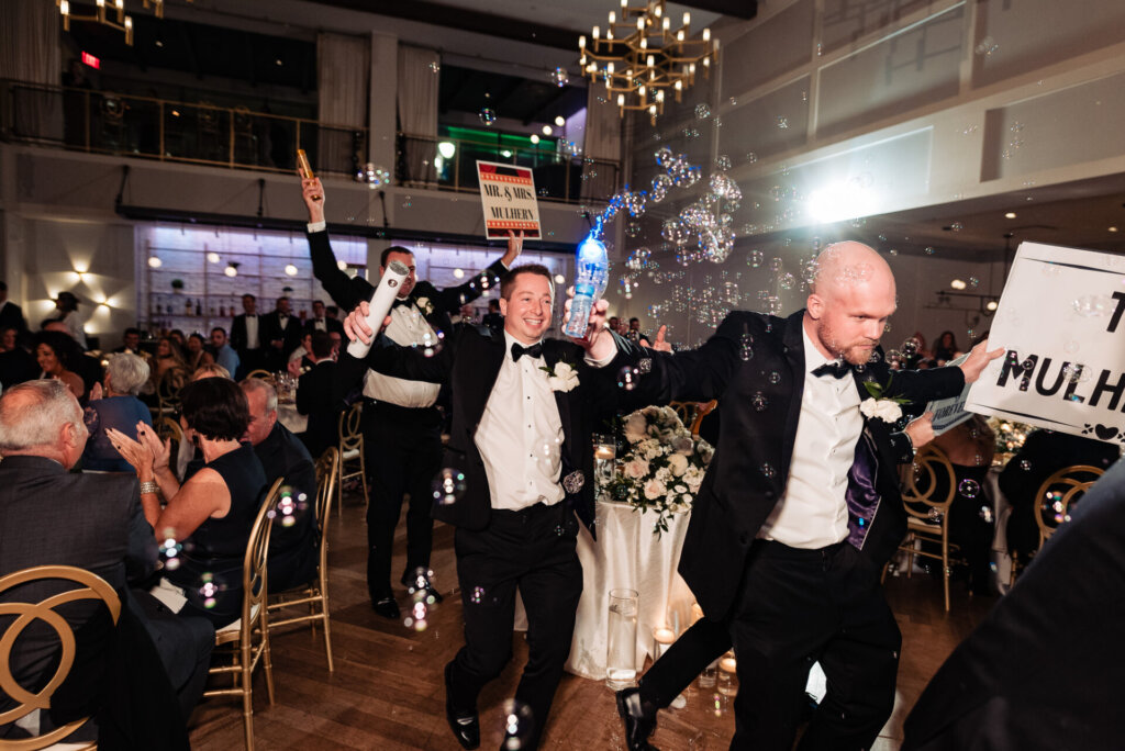 The guests raising signs and partying