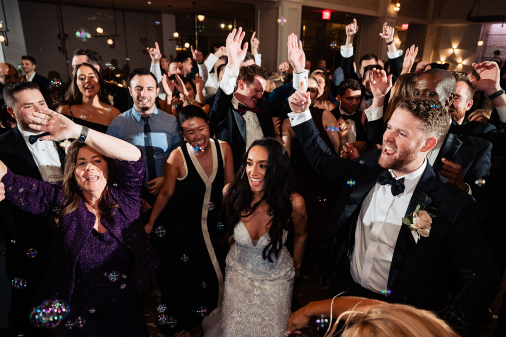 Candid shot of the bride enjoying the party