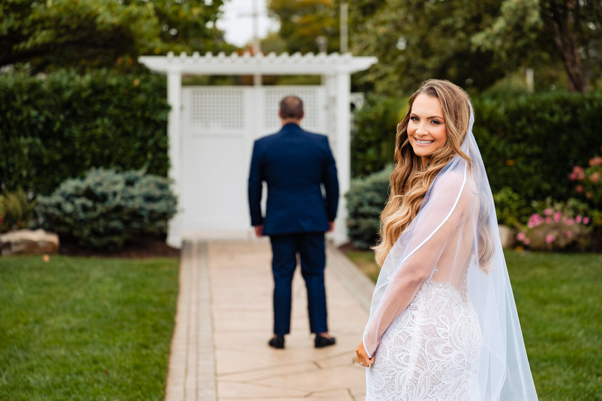 A stunning bridal portrait as she approaches her soon-to-be husband.