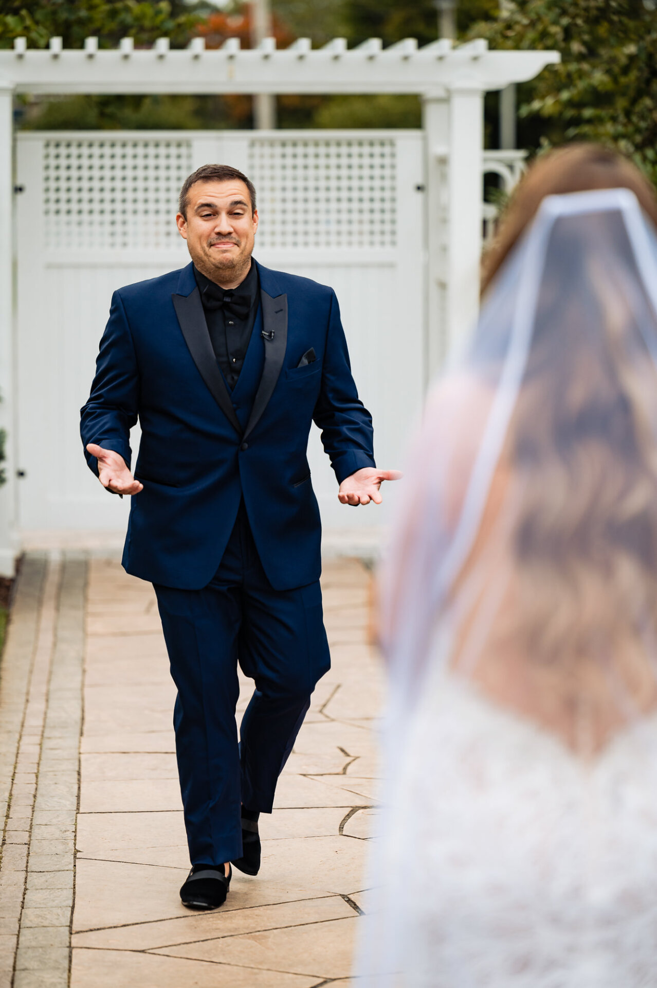 The groom as he approaches his soon-to-be wife.