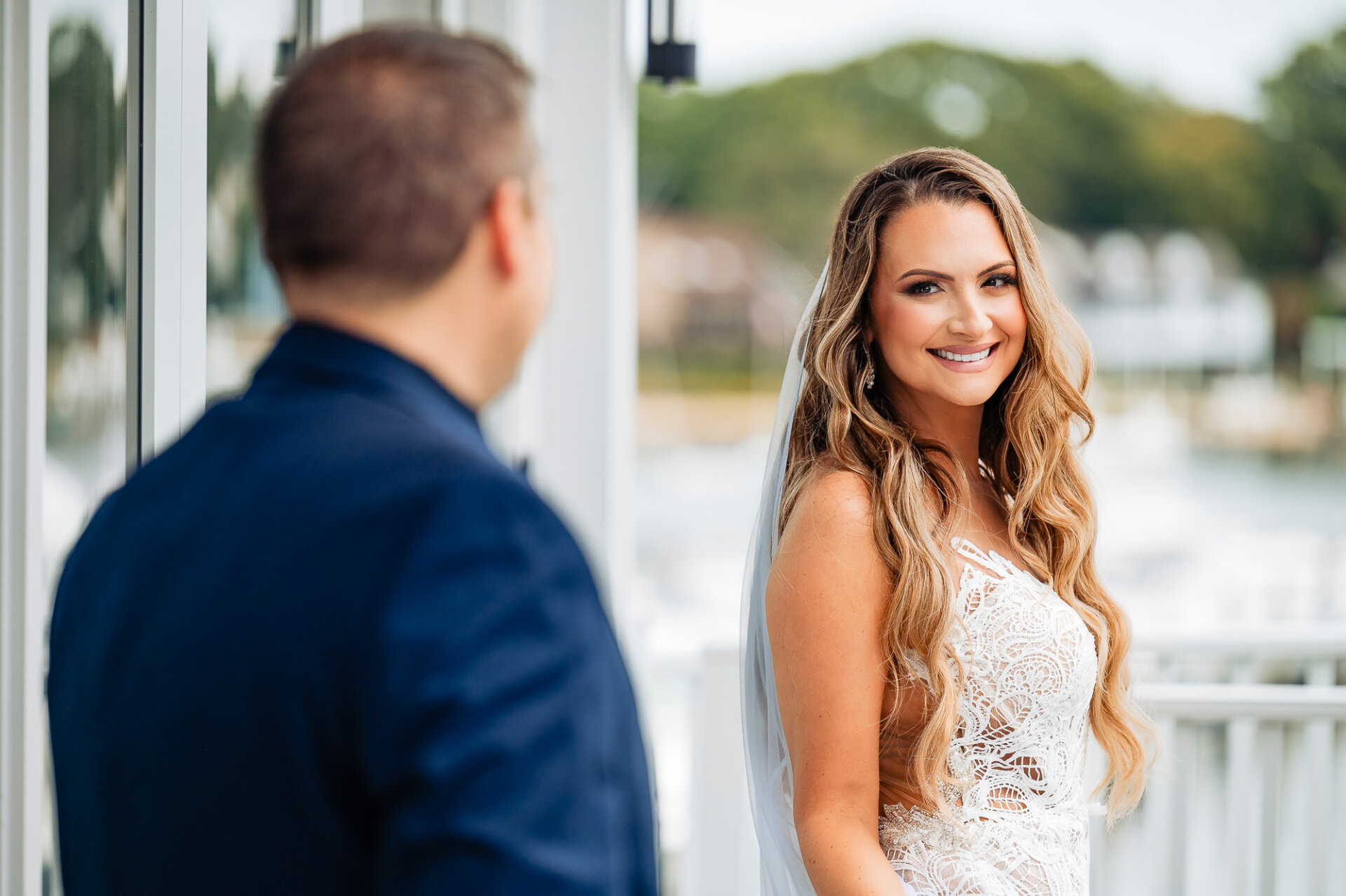 Bride smiling at the groom