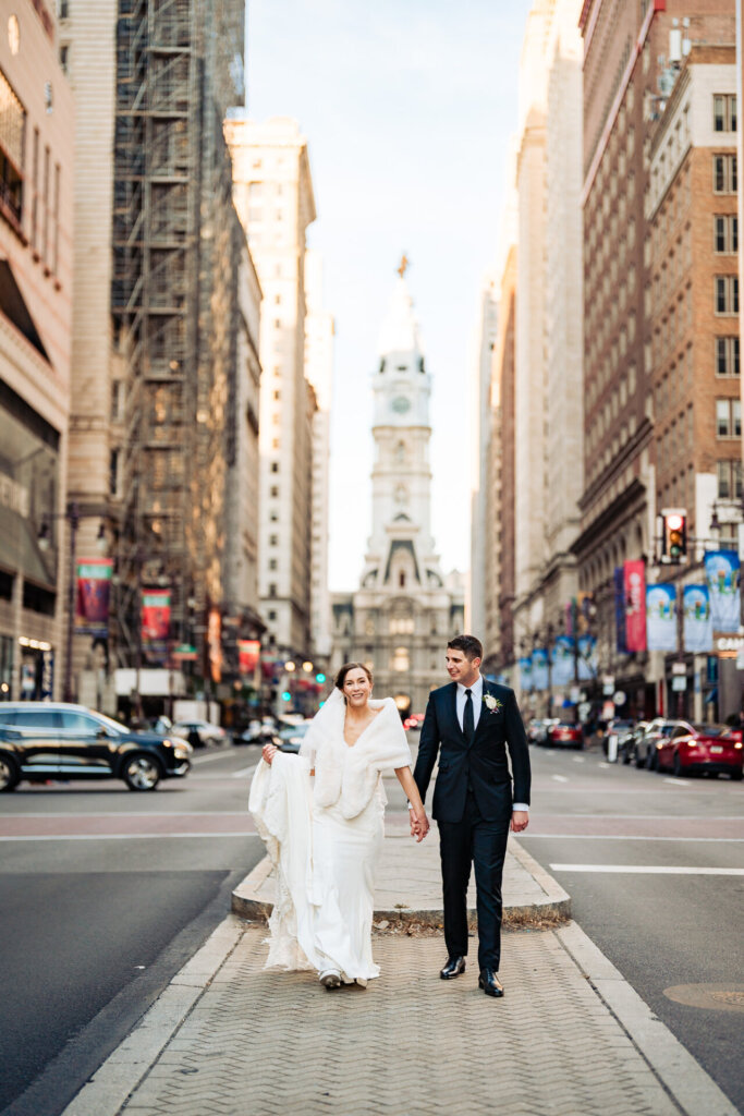A romantic moment with the city skyline in the background.